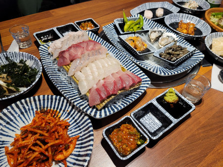 Japanese food set on a table in a restaurant, close-upの写真素材