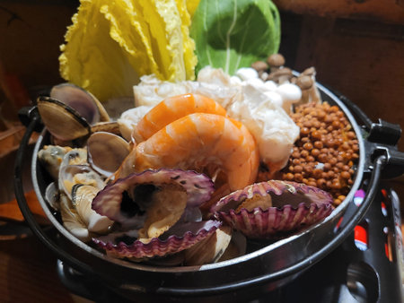 Seafood platter with vegetables and seafood in a restaurant.の写真素材