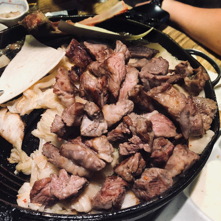 Korean traditional food, kimchi, grilled pork and riceの写真素材