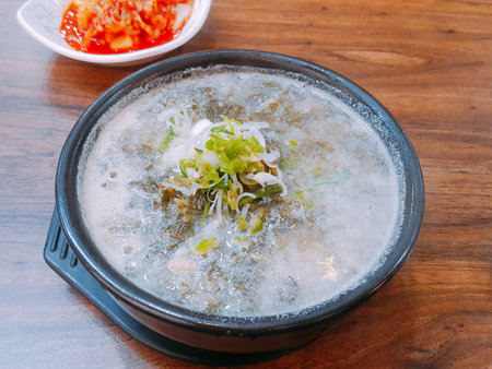 Rice gruel in a bowl on wooden table,Thailandの写真素材