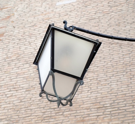 Classic lamp with brick wall background       の写真素材
