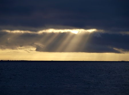 Sun through the stormy clouds        