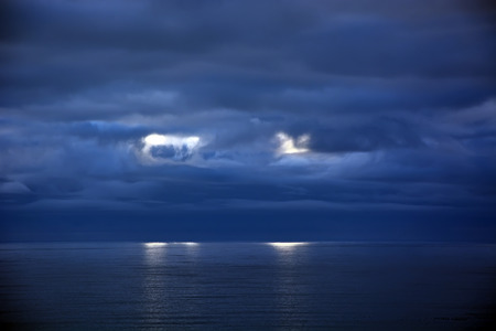 Stormy clouds above the Pacific oceanの写真素材