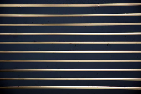 Abstract dark wooden background at the sunset