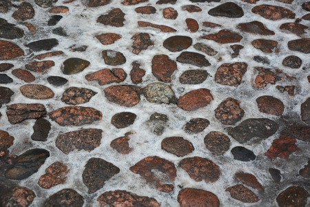 Pavement with snow. Picture can be used as a backgroundの写真素材
