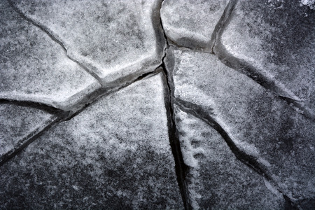 Cracked ice. Picture can be used as a backgroundの写真素材