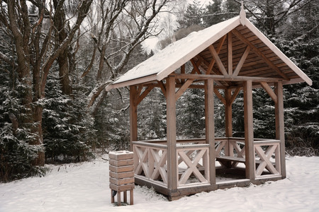 Wooden summerhouse at the winter season. Sepia tonedの写真素材