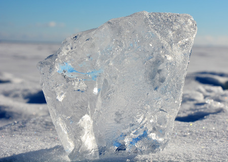 Crystal clear ice at sunny day at frozen sea