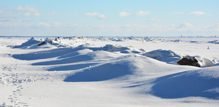 Polar landscape- frozen sea with blue sky backgroundの写真素材