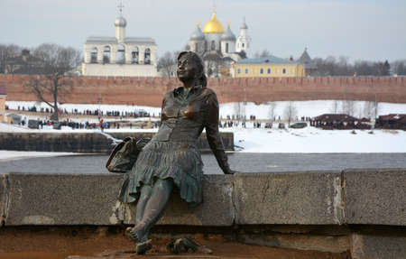 VELIKY NOVGOROD, RUSSIA - FEBRUARY 22, 2015: Monument, called "Tired woman tourist" on February 22, 2015 in Veliky Novgorodのeditorial素材