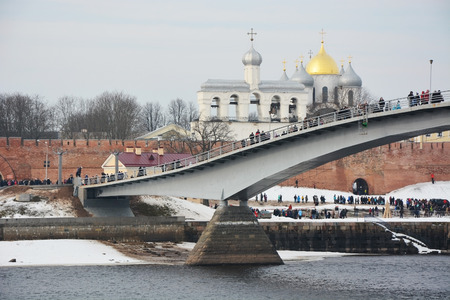 The bridge over the Volkhov River and Yaroslav's Court on February 22, 2015 in Veliky Novgorodのeditorial素材