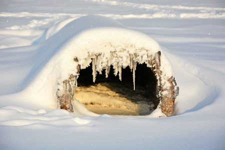 Beton pipe with iciclesの写真素材