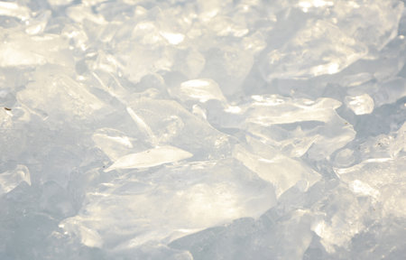 Background from broken pieces of ice. texture, pattern, closeup