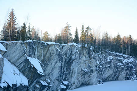 The famous marble quarry in the Republic of Karelia, Russia - Ruskeala quarry on a sunny, cold and winter dayの写真素材