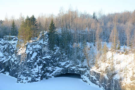The famous marble quarry in the Republic of Karelia, Russia - Ruskeala quarry on a sunny, cold and winter dayの写真素材