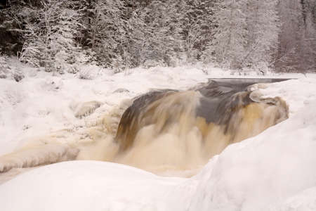 The pearl of Karelia Republic- Kivach waterfall at winter seasonの写真素材