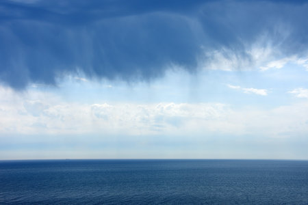 Rainy clouds above the Black Sea, Crimea, Russiaの写真素材