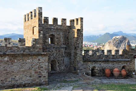 SUDAK, CRIMEA â€“ JUNE 10, 2019: Genoese fortress of the 14th century in the Sudak bay on the...