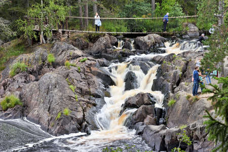 RUSKEALA, RUSSIA- AUGUST 31 2018: Ruskeala waterfalls at the Karelia republicのeditorial素材