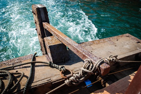 The steering mechanism of a typical abras boat in Dubai Creekのeditorial素材
