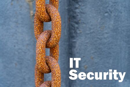 A big rusty chain with the words "IT Security" besides it - IT security conceptの写真素材
