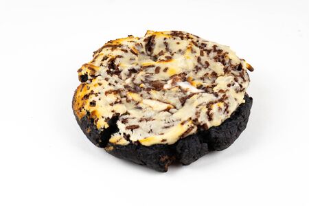 A cookie cake with chocolate on white background with copy spaceの写真素材