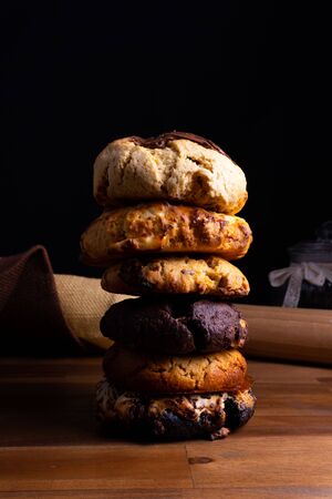 A tower built of a many different cookie cakesの写真素材