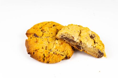 A cookie cake with chocolate on white background with copy spaceの写真素材