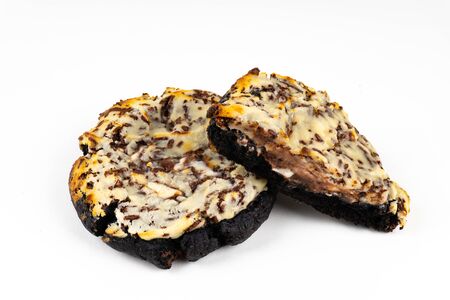 A cookie cake with chocolate on white background with copy spaceの写真素材