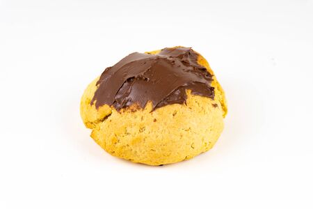 A cookie cake with chocolate on white background with copy spaceの写真素材