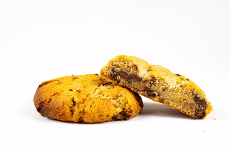 A cookie cake with chocolate on white background with copy spaceの写真素材