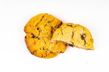 A cookie cake with chocolate on white background with copy spaceの写真素材