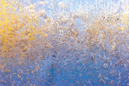 multicolored frost on frozen glass. these are colored frosty patterns