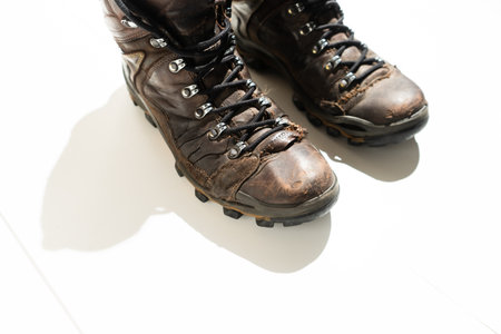 A pair of old boots for winter conditions.