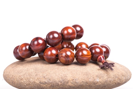 Bracelet made of wood brown color isolated on white backgroundの写真素材