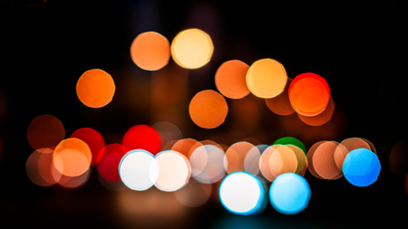 Defocused city lights blurred background with evening city lights.の写真素材