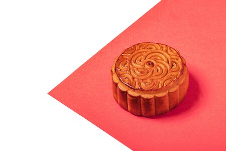 Chinese mooncake isolated on red backgroundの写真素材