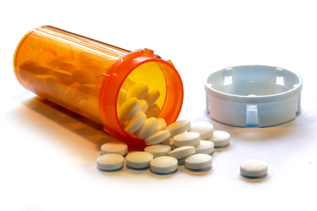 Opioid Crisis - Open Bottle of Prescription Painkiller Pillsの写真素材