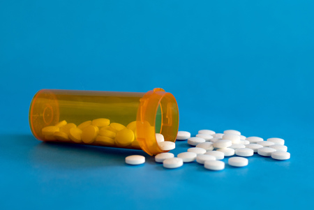 Opioid Crisis - Open Bottle of Prescription Painkiller Pillsの写真素材