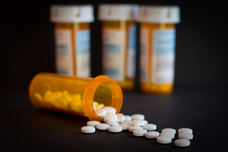 Opioid Crisis - Open Bottle of Prescription Painkiller Pillsのeditorial素材