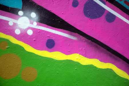 Colorful spray painted wall in a cityの写真素材