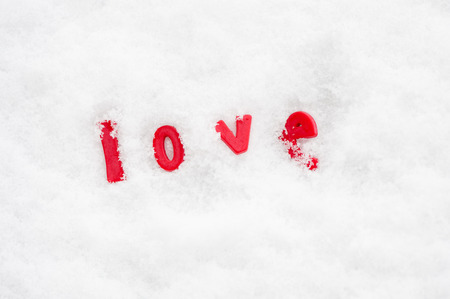 The word love in winter snowの写真素材
