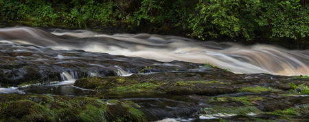 The Mellte river in full flow in the area known as Waterfall Country, Pontneddfechan, Neath, South...