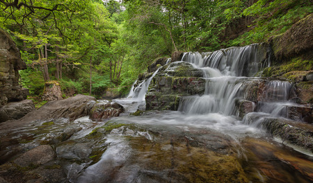Panwar, or Sgwd y Pannwr waterfall on the Mellte river, near Pontneddfechan in South Wales, UK.の写真素材