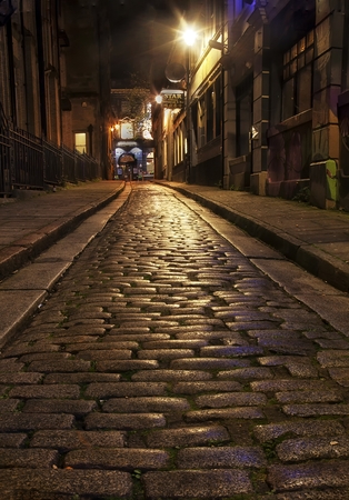 Editorial Swansea, UK - November 26, 2017: Green Dragon Lane, one of the last cobbled streets in Swansea. Originates from the Green Dragon Hotel whose history can be traced back to the 17th centuryのeditorial素材
