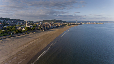 Editorial SWANSEA, UK - June 2, 2018: An aerial view of Swansea Bay, South Wales, UK, showing the old Guild Hall and Victoria Park.のeditorial素材