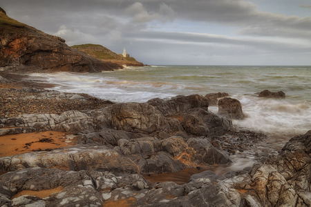 Blue Flag and Seaside Award winning Bracelet Bay beach near Mumbles Lighthouse on the Gower peninsula in Swansea, South Wales, UKの写真素材