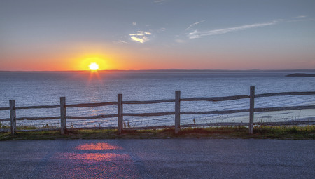 Summer Solstice sunset 2018 over Rhossili Beach on the Gower peninsula in Swansea, South Wales, UKの写真素材