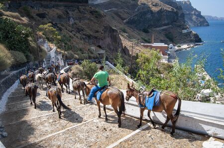 Editorial Santorini, Greece - July 05, 2013: Controversial method of transportation to the top of the Greek island of Santorini other than by cable car or walking.のeditorial素材
