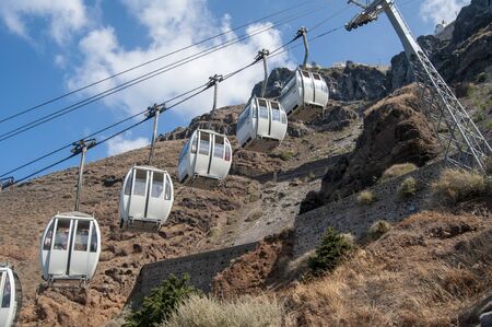 Editorial Santorini, Greece - July 05, 2013: The alternative method of getting to the top of the Greek island of Santorini other than by horseback or walking.のeditorial素材